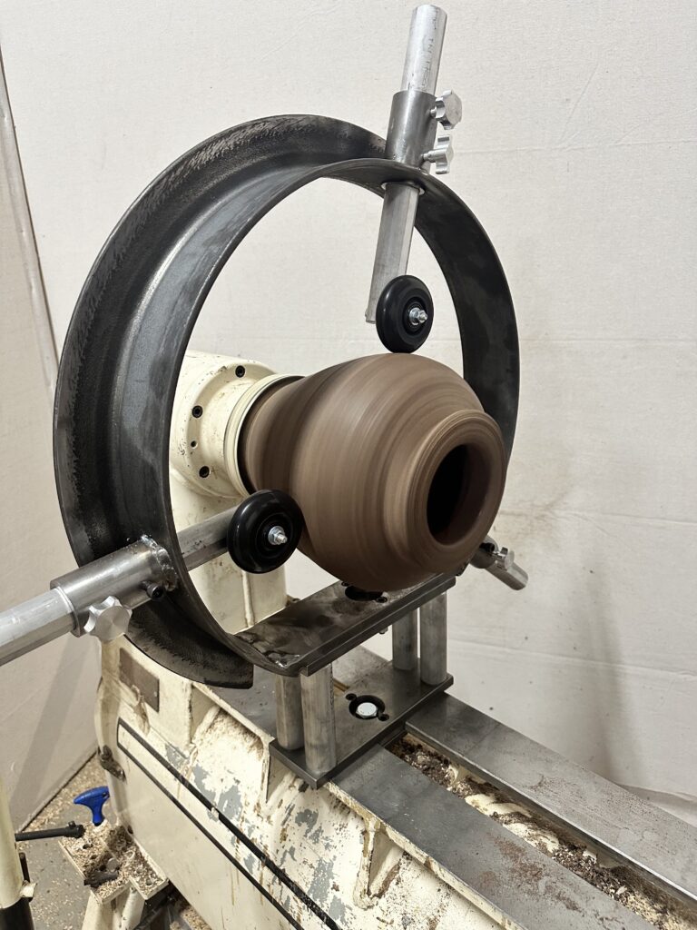Unpainted, boosted 12" swing Clark Steady rest on a 24" swing lathe by Clark Woodturning Tools